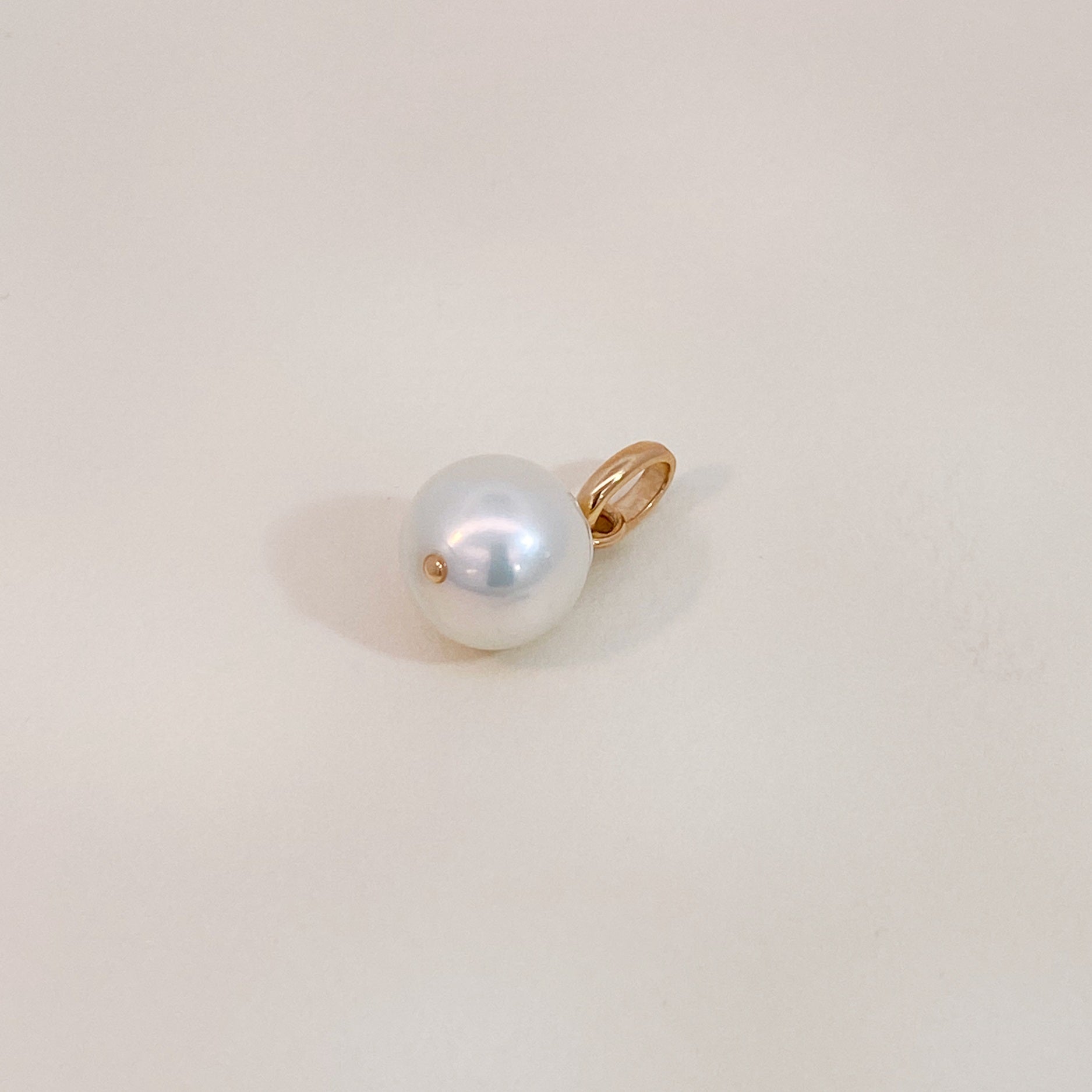 Tiny Baroque Pearl Golden Pendant
